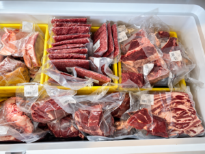 Freezer filled with packaged beef, pork and chicken from Hillview Livestock
